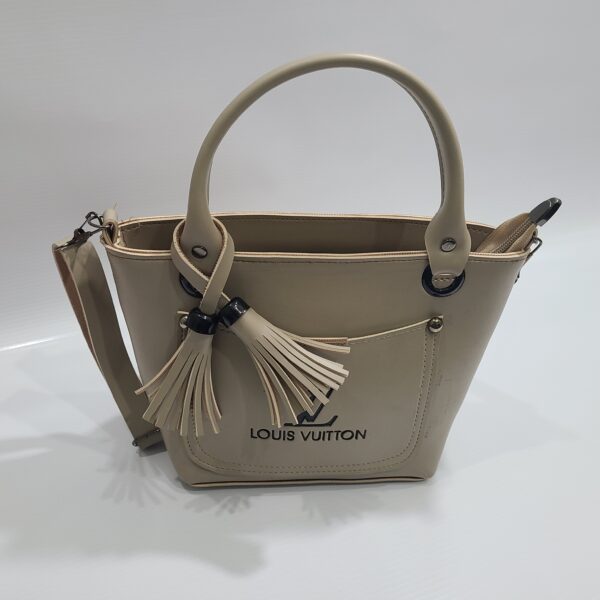 Elegant Beige Handbag with Tassel and Detachable Strap