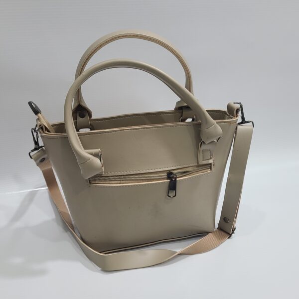 Elegant Beige Handbag with Tassel and Detachable Strap - Image 2